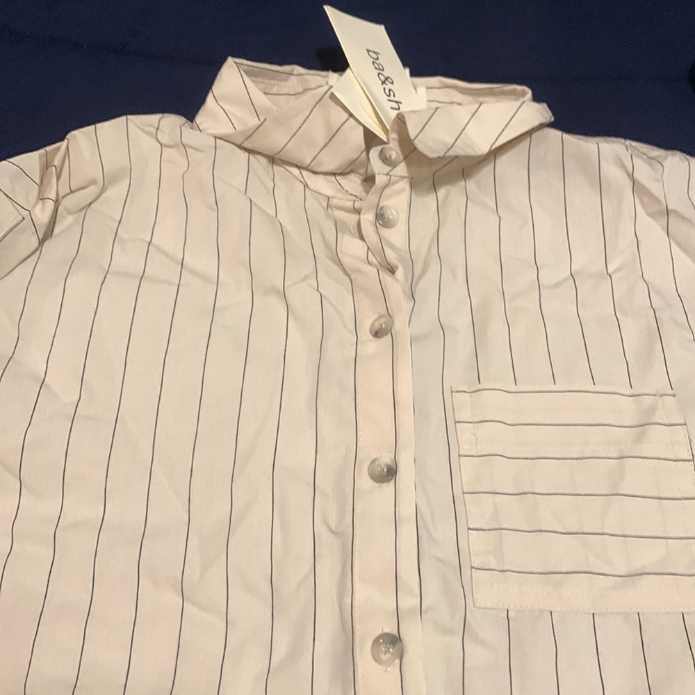 Nice special occasion blouse cream colored with strips and buttons